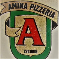 Photo taken at Amina Pizzeria LLC by Amina Pizzeria LLC on 5/2/2023