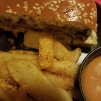 Photo taken at Red Robin Gourmet Burgers and Brews by Jenna S. on 5/22/2019
