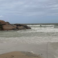 Photo taken at Praia da Joaquina by Gabriela V. on 12/8/2023