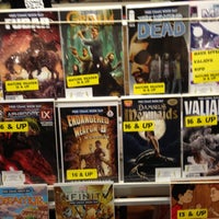 Photo taken at A Little Shop of Comics by Philip L. on 5/4/2013