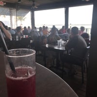 Photo taken at Flippers on the Bay by Sherry P. on 3/27/2018