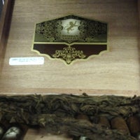 Photo taken at Belicoso Cigars by Kyle S. on 12/12/2012