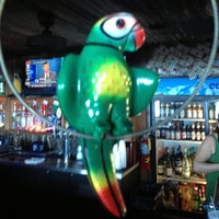 Foto diambil di The Parrot Bar and Grill oleh George T. pada 12/11/2013