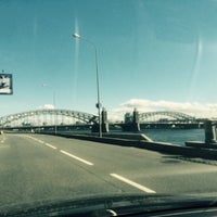 Photo taken at Bolsheokhtinsky Bridge (Peter the Great Bridge) by Igor  S. on 5/15/2015