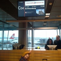 Photo taken at Gate C04 by Tema P. on 1/1/2014