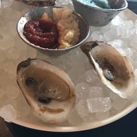 Photo taken at Amberjax Fish Market Grille at Trinity Groves by Katie E. on 2/17/2019