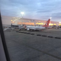 Photo taken at Gate A10 by Nicolas D. on 3/6/2018