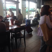 Photo taken at Starbucks by Lucy T. on 7/1/2016