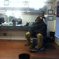 Photo taken at Cuttin-Up Barber Shop by Jay C. on 2/20/2014