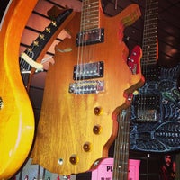 Photo taken at 30th Street Guitars by David B. on 1/5/2013