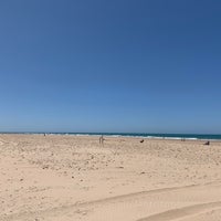 Photo taken at Cortadura Beach by Yigit K. on 6/6/2019