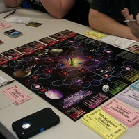 Photo taken at 8th Dimension Comics &amp;amp; Games by Kerry H. on 3/2/2013
