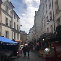 Photo taken at Marché Mouffetard by Tom F. on 3/14/2018