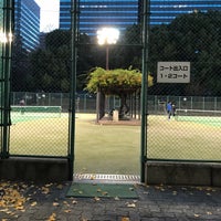 Photo taken at Hibiya Park Tennis Court by Hayato on 12/9/2018