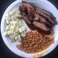 Photo taken at Rolling Smoke BBQ truck by Emily G. on 6/3/2018