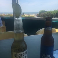 Photo taken at Lighthouse Beach Bar &amp;amp; Grille by Katie on 6/12/2016