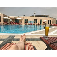 Photo taken at Al Bustan Rotana Hotel  فندق البستان روتانا by Tan N. on 3/23/2017