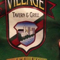 Photo taken at Village Tavern &amp;amp; Grill by Lisa F. on 5/1/2015