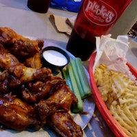 Photo taken at Pluckers Wing Bar by Pedro R. on 8/24/2021