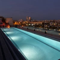 Photo taken at Soho House Rooftop Pool by Andrea D. on 3/25/2023