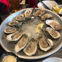 Photo taken at The Island Grille &amp;amp; Raw Bar by Leah Y. on 12/24/2019