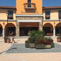 Photo taken at Valdichiana Outlet Village by Céline V. on 8/5/2019