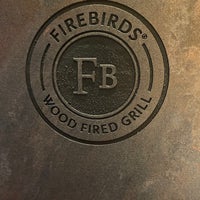 Photo taken at Firebirds Wood Fired Grill by Minta B. on 2/5/2022