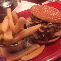Photo taken at Red Robin Gourmet Burgers and Brews by Minta B. on 7/1/2015