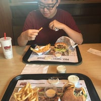 Photo taken at The Habit Burger Grill by Minsoo K. on 7/14/2017