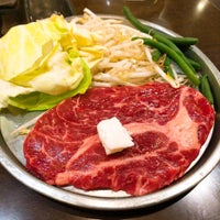 Photo taken at 肉屋の正直な食堂 神田神保町店 by ゆう ふ. on 2/21/2019