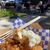Photo taken at Lincoln Square Apple Fest by Colleen M. on 10/1/2022