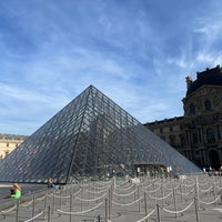 Photo taken at Louvre Pyramid by Glynn on 8/2/2022