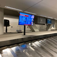 Photo taken at Baggage Claim 1-6 by Hin T. on 12/24/2019