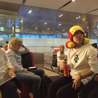 Photo taken at Gate A21 by Eve Y. on 3/14/2016