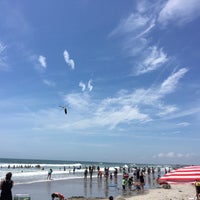 Photo taken at 7th Street Beach by Jesse G. on 6/27/2016