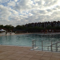 Photo taken at Parliament Hill Lido by Jackson C. on 5/6/2013