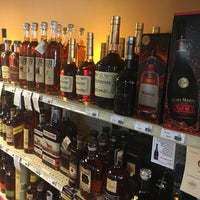 Photo taken at Tobacco &amp; Rum Package Store by Stacy M. on 5/4/2016