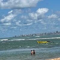 Photo taken at Praia de Itapuã by Evanice P. on 6/17/2021