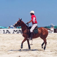 Photo taken at Miami Beach Polo World Cup by Ashley C. on 4/26/2014