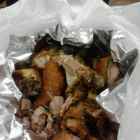 Photo taken at Totos Lechon by Laura L. on 12/28/2012