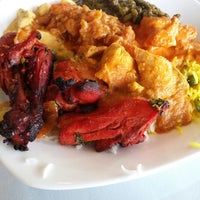 Photo taken at New India&amp;#39;s Oven: Exotic Cuisine of India by Eric R. on 8/2/2014