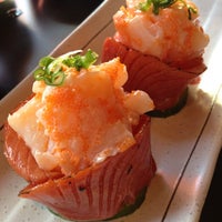 Photo taken at Sushi K Kamizato 神里 by Frank L. on 11/24/2012