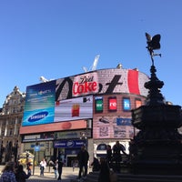 Photo taken at Piccadilly Circus by Brad B. on 4/20/2013