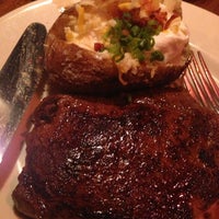 Photo taken at Outback Steakhouse by Nate H. on 7/14/2013