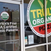 Photo taken at Truly Organic Pizza by Ike L. on 6/15/2013