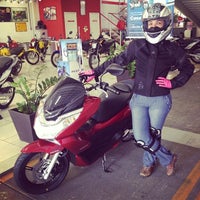 Photo taken at Dicasa Motos Honda by Isabelle A. on 12/13/2013