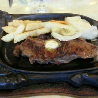 Photo taken at Borshch Steakhouse by Min Jia on 10/26/2012