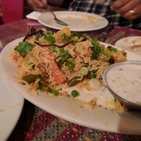 Photo taken at Aangan Indo-Nepalese Cuisine by Adrienne S. on 5/22/2017