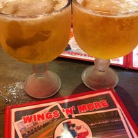Photo taken at Wings &amp;#39;N More by Michael M. on 12/23/2012