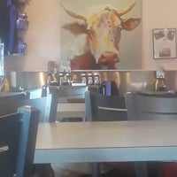 Photo taken at The Purple Cow Restaurant by Ami C. on 1/31/2019